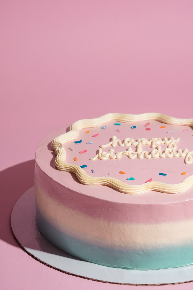 Birthday Cake on Pink Background